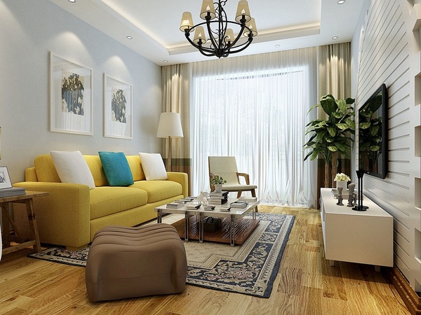 Trần và tường phòng khách được sơn màu trắng để nới rộng không gian, điểm nhấn ấn tượng là bộ ghế sofa màu vàng