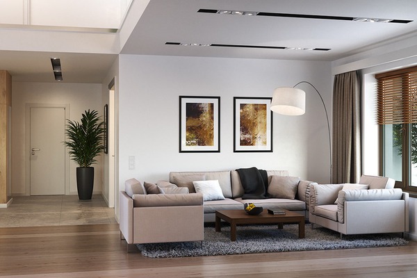 Phòng khách nhỏ được bày trí đơn giản, gọn gàng nhưng đầy đủ tiện nghi với bàn trà và ghế sofa tông màu nâu nhạt